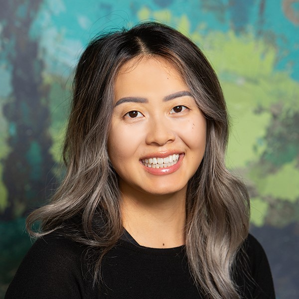 Ms. Her, teacher at Aris Clinic.