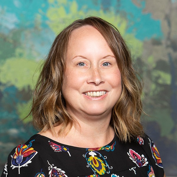 Ms. Fiege, teacher at Aris Clinic.