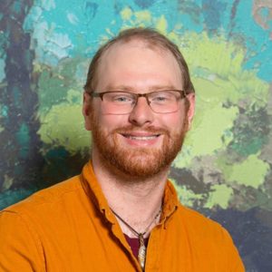 Headshot of Zach Johnson., psychotherapist at Aris Clinic.